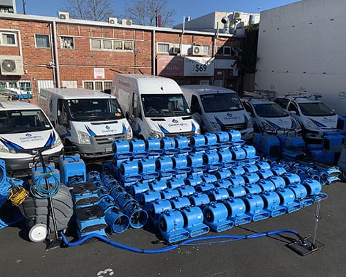 iDry technician performing flood restoration work in an Auckland property